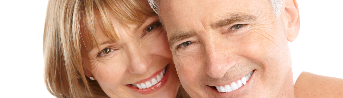 Happy elderly senior couple in love. Isolated over white background.