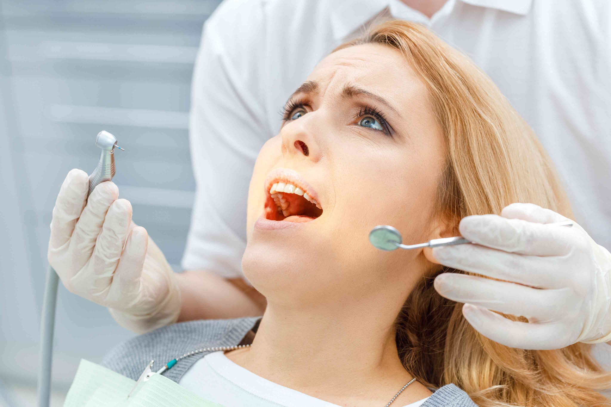 Patient receiving an emergency dental examination.